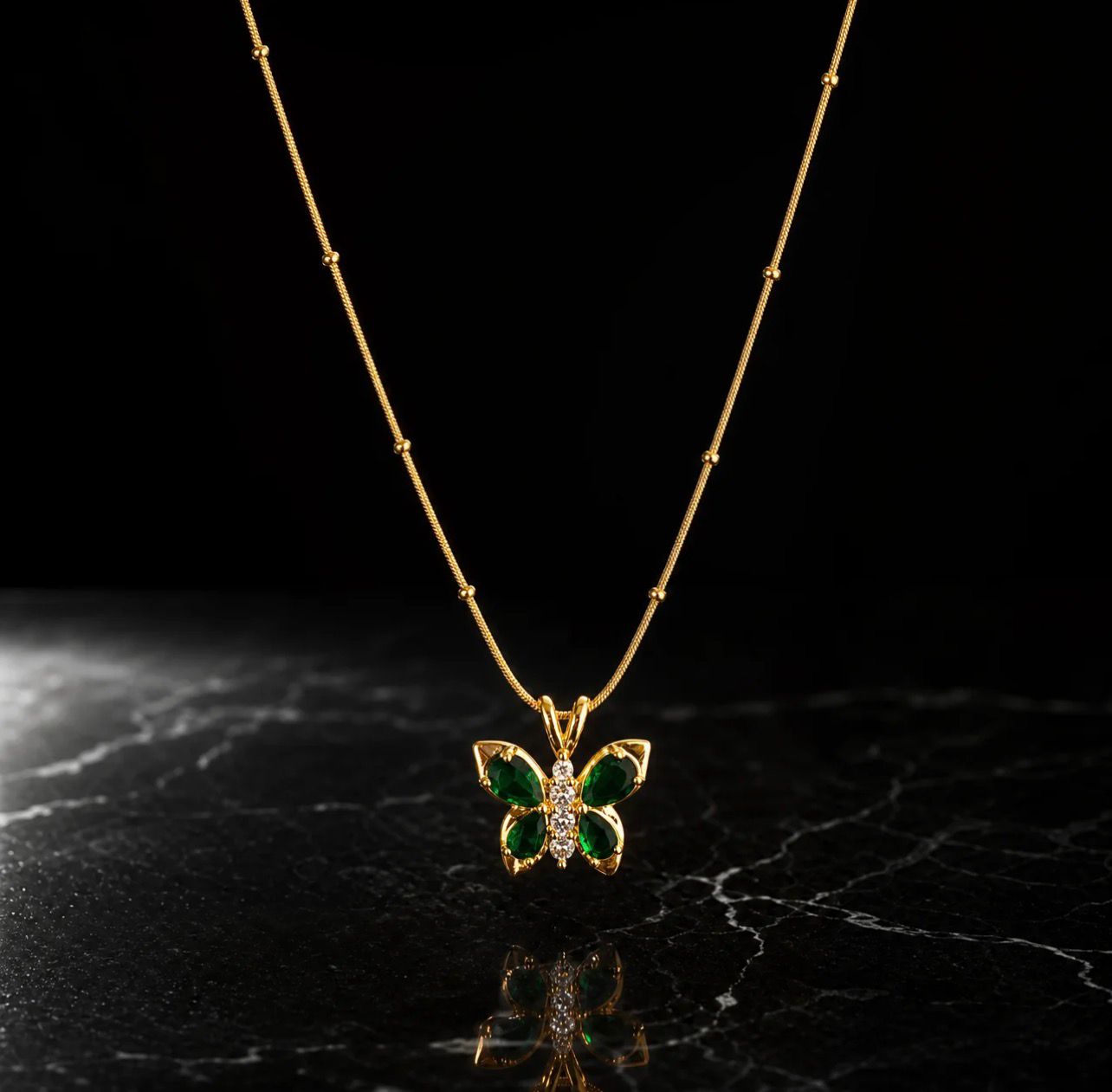 Emerald Butterfly Necklace by Fathora Collections