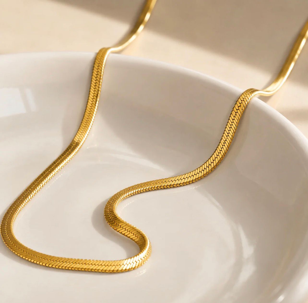 Golden Herringbone Necklace by Fathora Collections