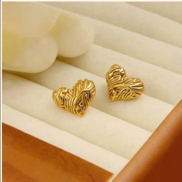 Heart Themed Stud Earrings by Fathora Collections