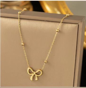 Infinity Bow Pendant by Fathora Collections