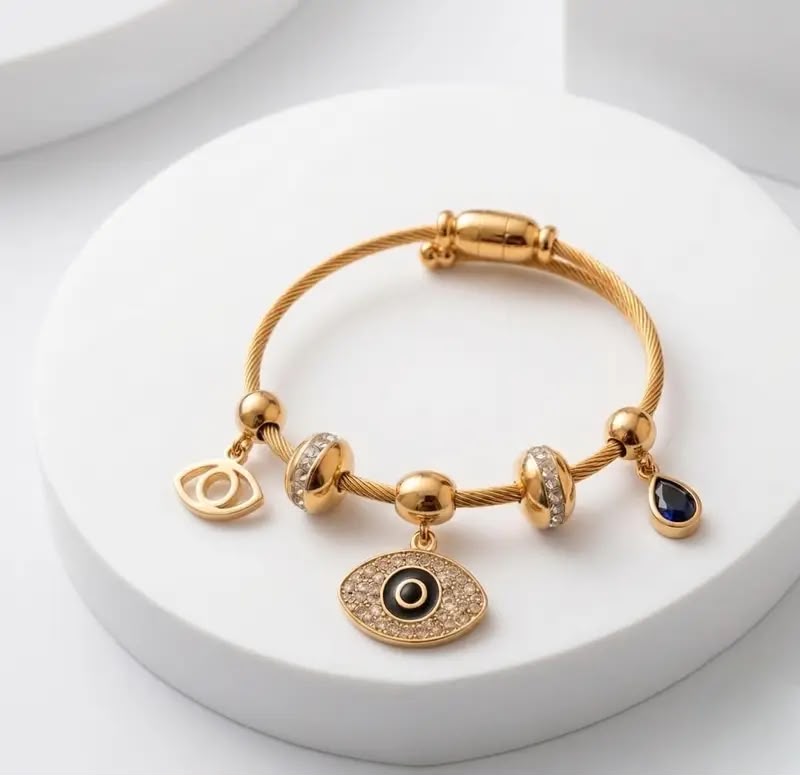 Nazaria Crystal Evil Eye Twisted Bangle by Fathora Collections